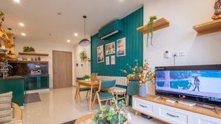 Căn hộ 54m² đẹp cuốn hút với gam màu xanh gần gũi với thiên nhiên có chi phí hoàn thiện nội thất 150 triệu đồng ở Hà Nội